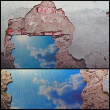 A wall with two different images of the same sky.