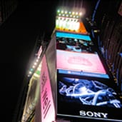 A bunch of billboards that are lit up