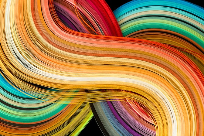 A close up of the colorful paper waves