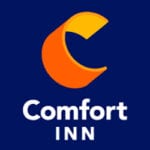 Comfort Inn logo with a stylized orange and yellow design.